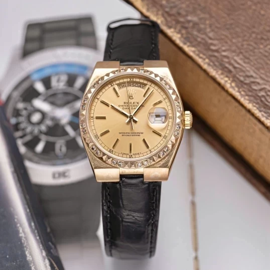 Rolex Oysterquartz Day-Date 19018 Yellow Gold Champagne Dial Diamond Bezel