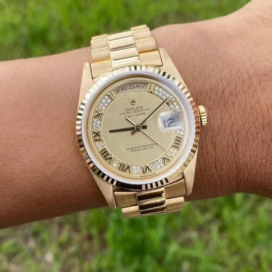 Rolex Oyster Perpetual Day-Date 36mm 18K Yellow Gold Champagne Roman Diamond Dial – Ref. 18238
